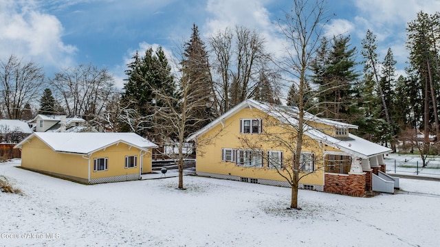 view of snow covered property