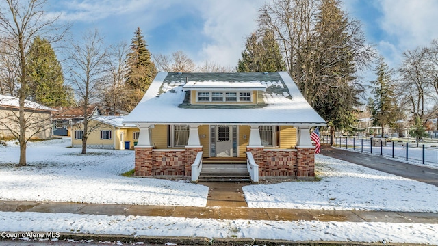 bungalow-style home featuring a porch