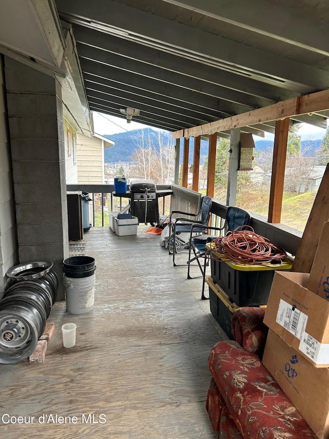 view of patio / terrace with a mountain view and grilling area