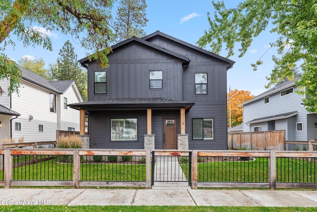 view of front of home with a front lawn