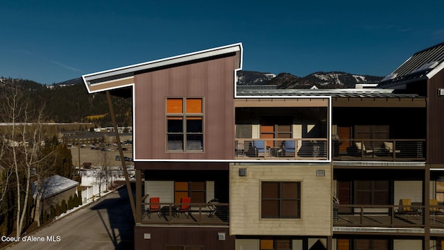 view of building exterior with a mountain view