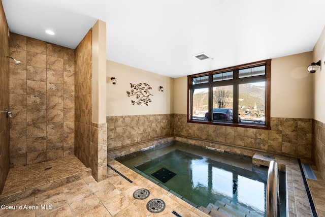 interior space with an indoor hot tub