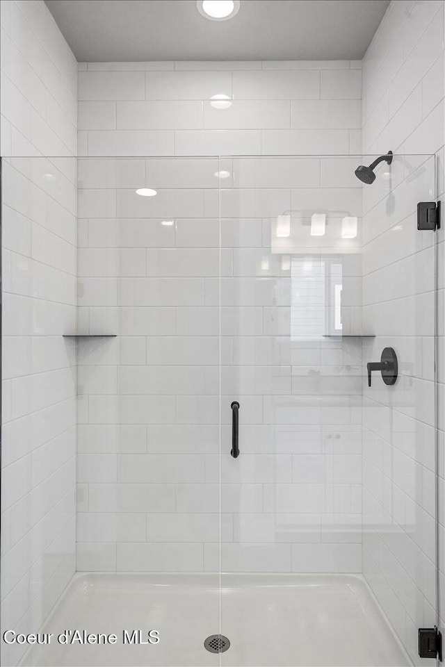 bathroom featuring walk in shower