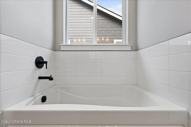 bathroom featuring a bathing tub