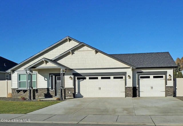 craftsman house featuring a garage