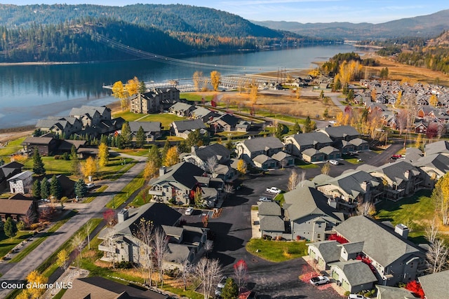 bird's eye view featuring a water and mountain view