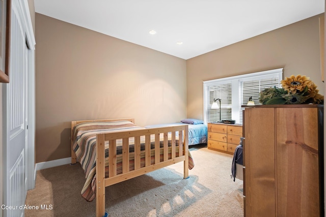 bedroom featuring carpet