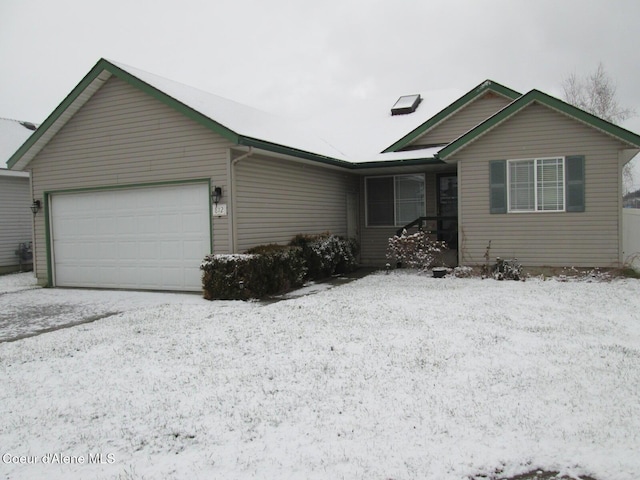 single story home with a garage