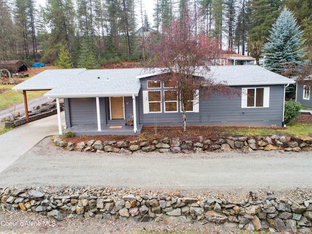 view of front of house with a carport