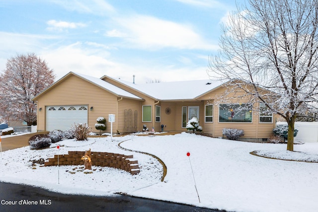 ranch-style home with a garage