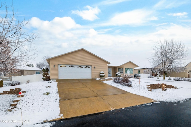 ranch-style home with a garage