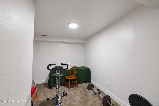 workout room with carpet flooring