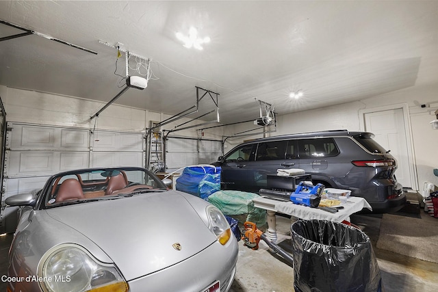 garage featuring a garage door opener