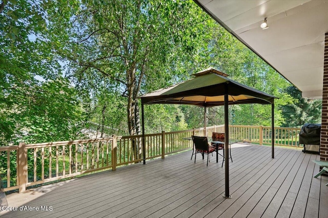 wooden terrace with grilling area