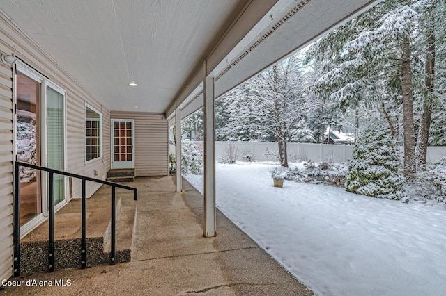 view of snow covered patio