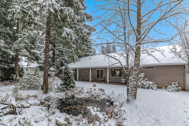 view of snow covered property