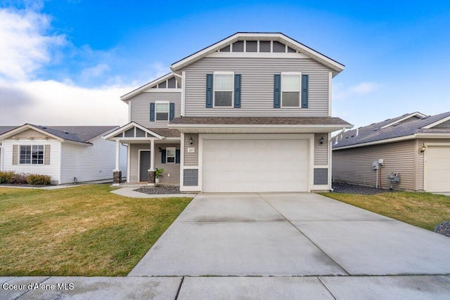 front facade with a front yard and a garage