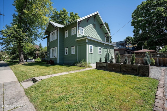 view of home's exterior featuring a yard