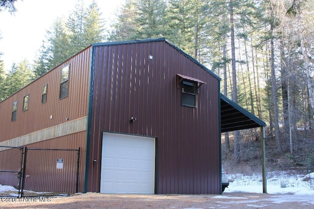 view of outbuilding featuring driveway