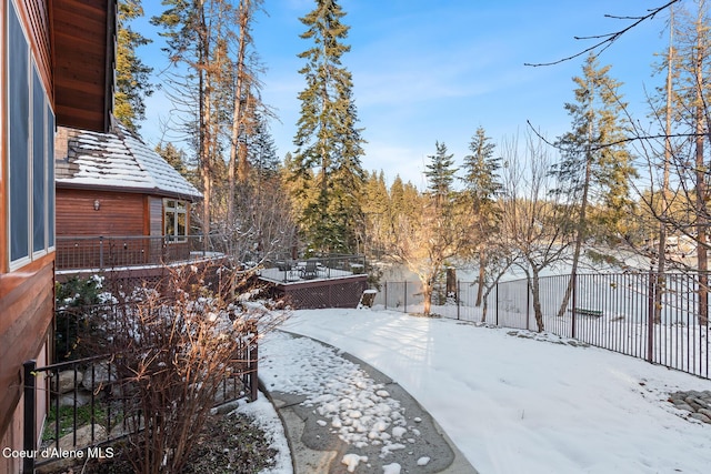 view of snowy yard