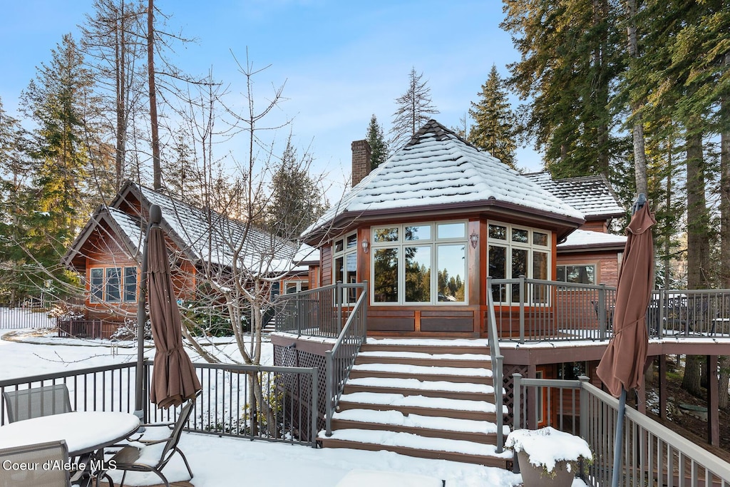 view of snow covered deck