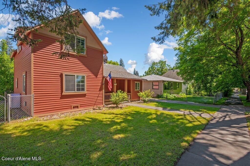 exterior space with a front lawn