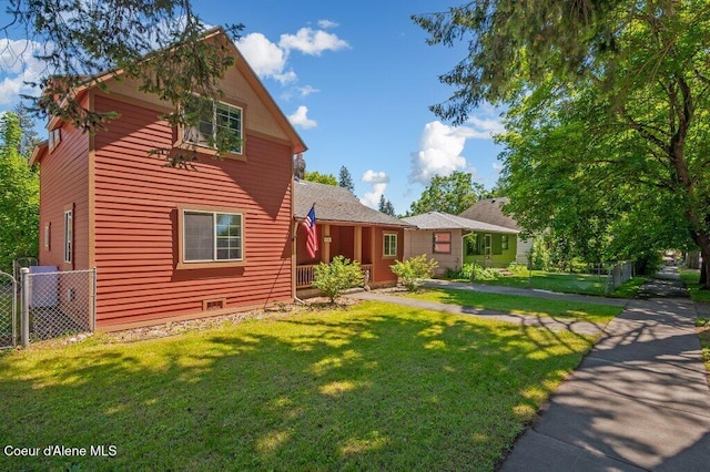 exterior space with a front lawn