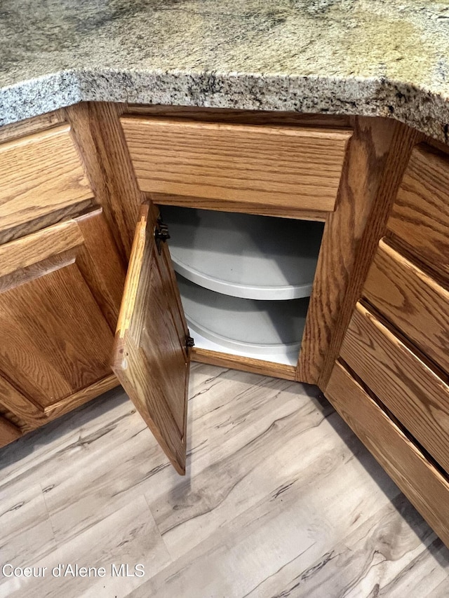 interior details featuring light hardwood / wood-style floors