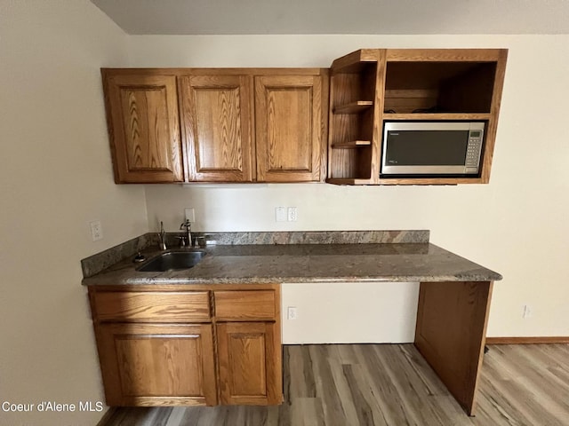 kitchen featuring sink and hardwood / wood-style floors