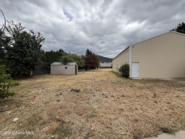 6344 N Colfax St, Dalton Gardens, ID 83815 - view of yard featuring a storage shed
