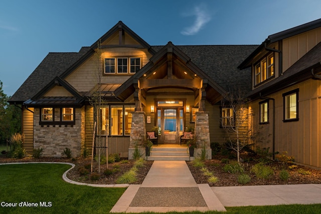 view of front of home with a lawn