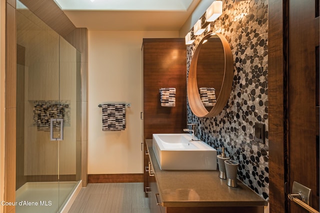 bathroom featuring vanity and walk in shower