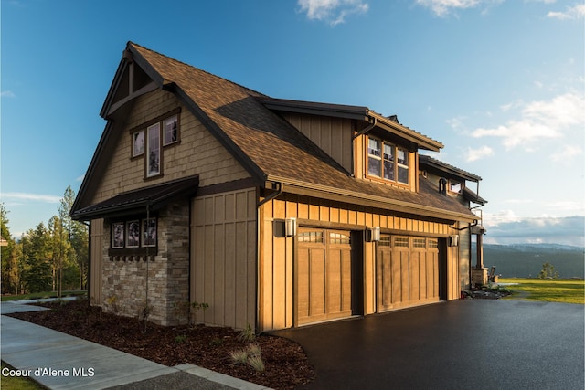 view of property exterior featuring a garage