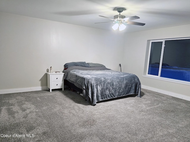 bedroom with ceiling fan and carpet