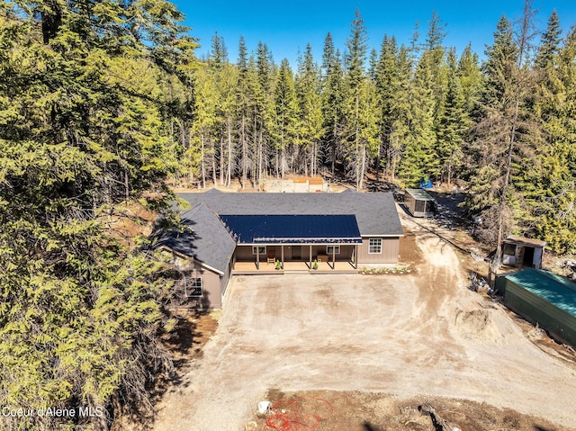 bird's eye view with a forest view