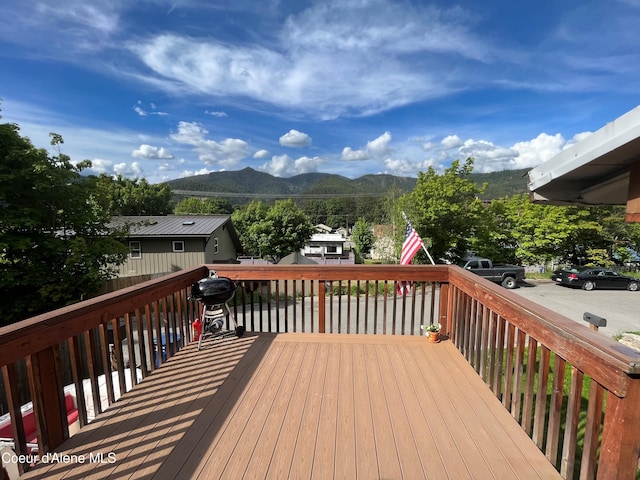 wooden terrace with a mountain view