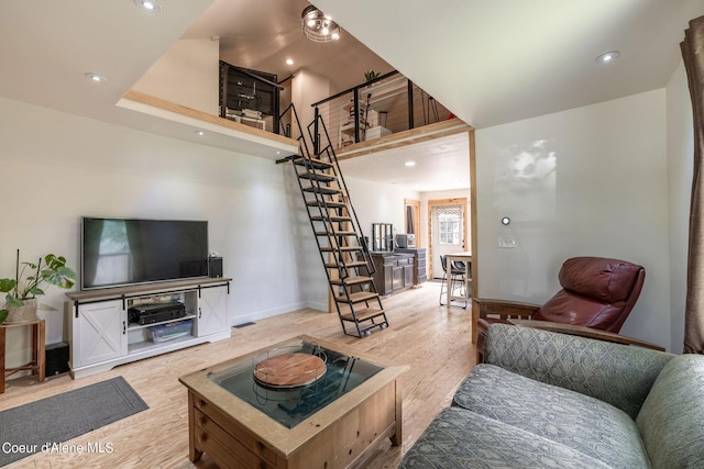 living room with light hardwood / wood-style floors