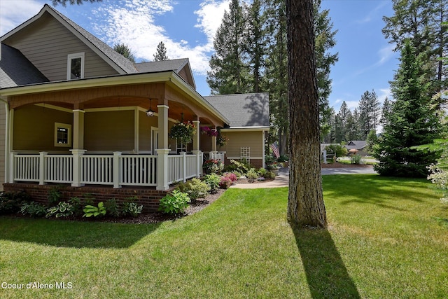 view of side of property featuring a yard