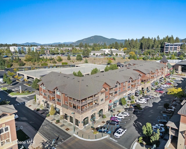 drone / aerial view featuring a mountain view