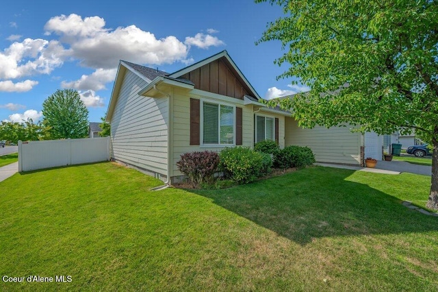 1449 N Moonstone St, Post Falls, ID 83854 - view of property exterior with board and batten siding