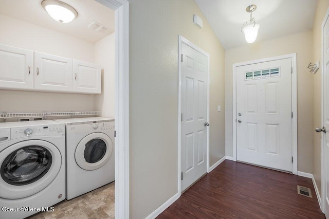 1449 N Moonstone St, Post Falls, ID 83854 - washroom featuring independent washer and dryer, cabinet space, and wood finished floors