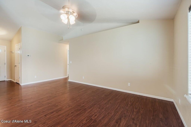 1449 N Moonstone St, Post Falls, ID 83854 - spare room featuring a ceiling fan, dark wood finished floors, and lofted ceiling