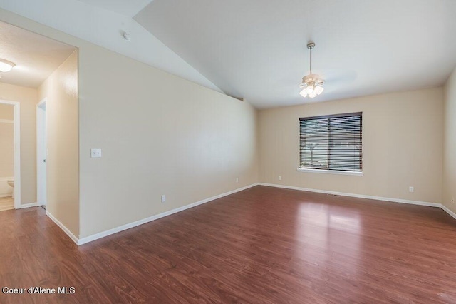 1449 N Moonstone St, Post Falls, ID 83854 - empty room with a ceiling fan, wood finished floors, and vaulted ceiling