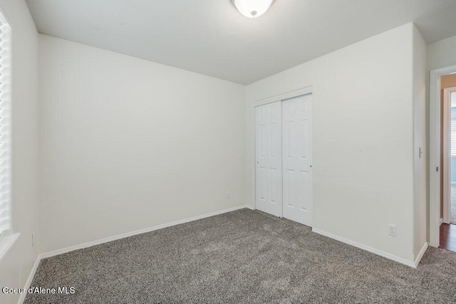 1449 N Moonstone St, Post Falls, ID 83854 - unfurnished bedroom featuring carpet flooring and a closet