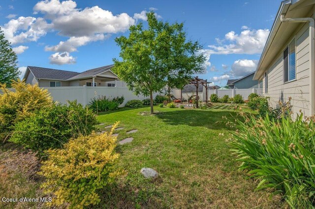 1449 N Moonstone St, Post Falls, ID 83854 - view of yard with a pergola