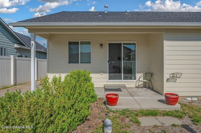 1449 N Moonstone St, Post Falls, ID 83854 - rear view of house featuring a patio and roof with shingles