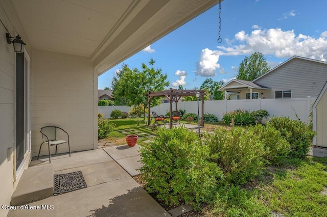 1449 N Moonstone St, Post Falls, ID 83854 - fenced backyard featuring a pergola and a patio