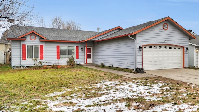 ranch-style home with a front lawn and a garage