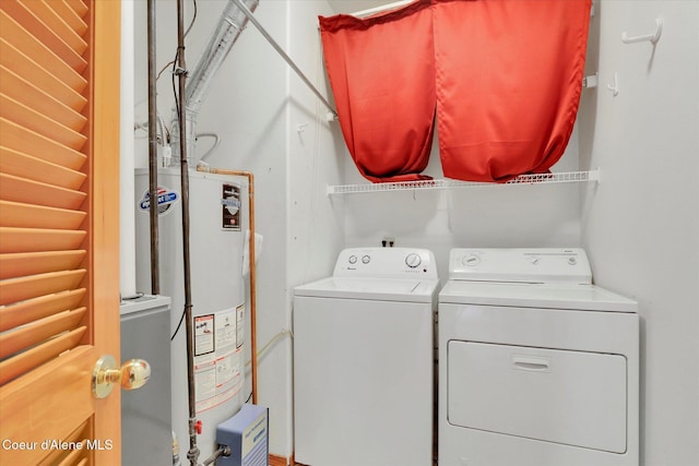 washroom featuring separate washer and dryer and gas water heater