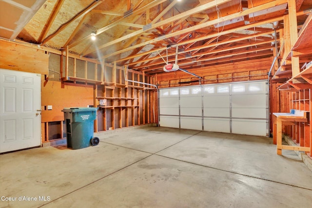 garage featuring a garage door opener